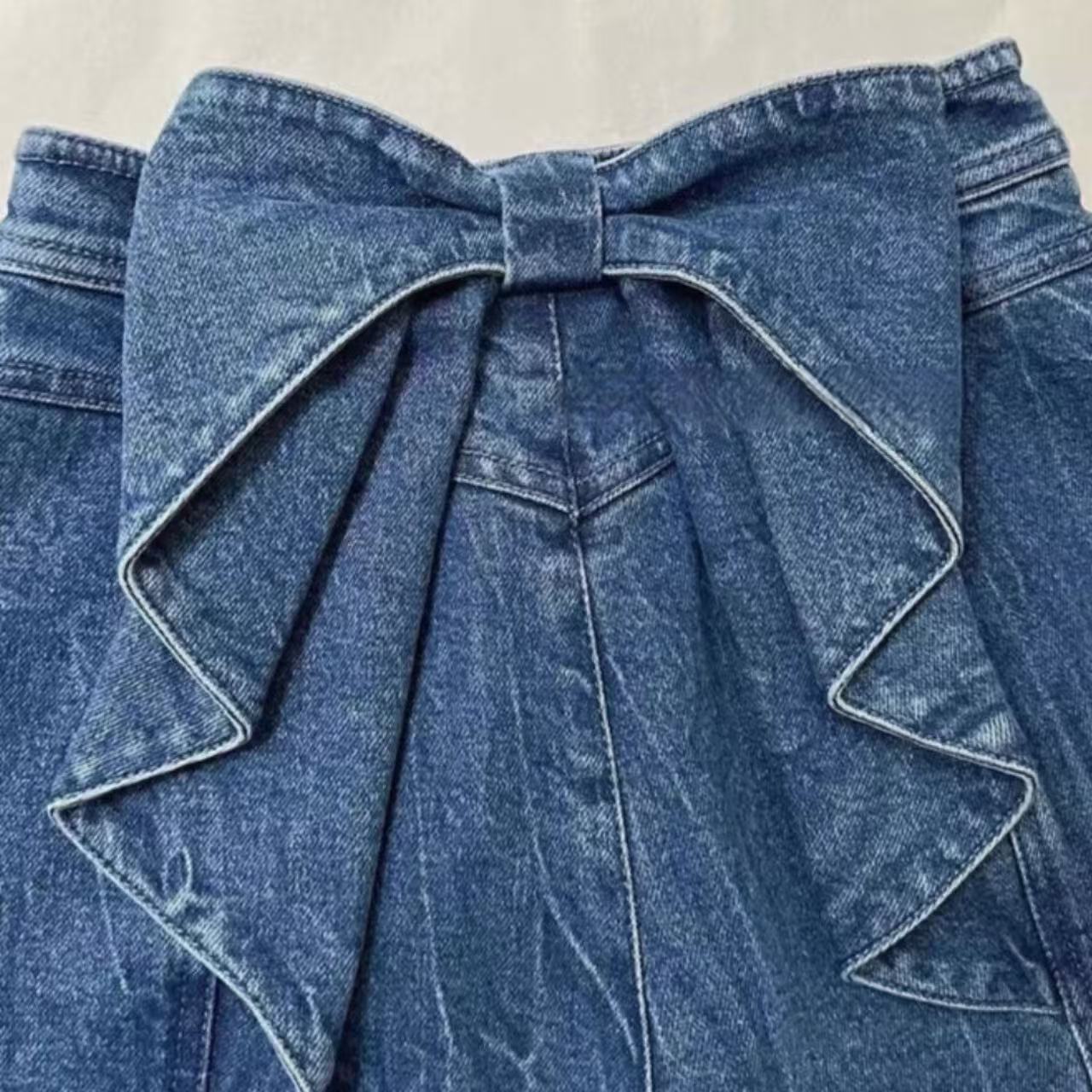 骨格ウェーブ バックリボンデザインハイウエスト デニムパンツ 脚長効果 